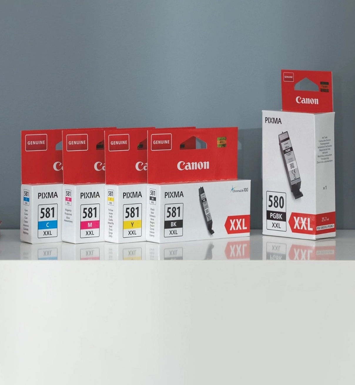 Canon ink cartridge packaging on a gray background